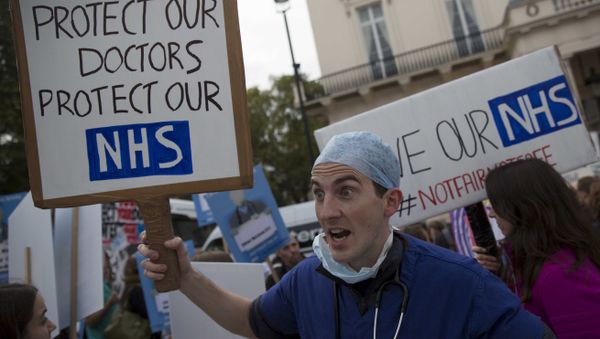 A protester holds a placard at a demonstration in support of junior doctors in London, in this file photograph dated October 17, 2015 A protester holds a placard at a demonstration in support of junior doctors in London, in this file photograph dated October 17, 2015 - Sputnik International