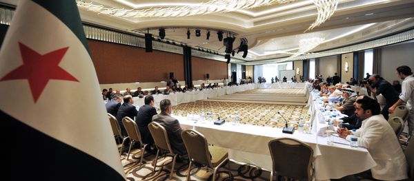 Members of Syrian National coalition (SNC) attend a meeting of the National Coalition of Syrian Revolution and Opposition forces on September 13, 2013, in Istanbul Members of Syrian National coalition (SNC) attend a meeting of the National Coalition of Syrian Revolution and Opposition forces on September 13, 2013, in Istanbul - Sputnik International