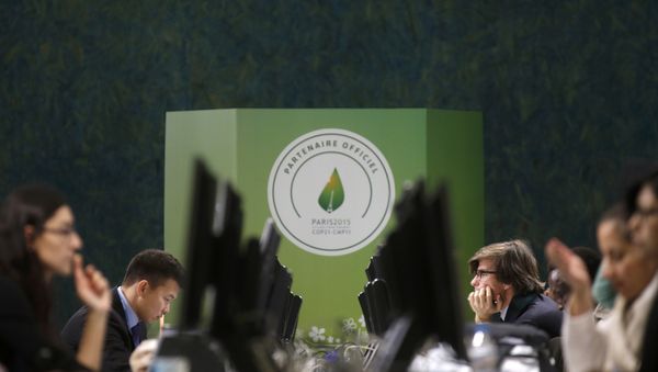 Participants are seen at a digital working space during the World Climate Change Conference 2015 (COP21) at Le Bourget, near Paris, France, December 1, 2015 - Sputnik International