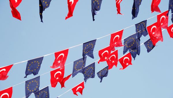 Turkish and European Union flags fly together at Taksim Square on May 24, 2013, in Istanbul - Sputnik International