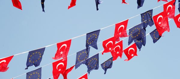 Turkish and European Union flags fly together at Taksim Square on May 24, 2013, in Istanbul Turkish and European Union flags fly together at Taksim Square on May 24, 2013, in Istanbul - Sputnik International