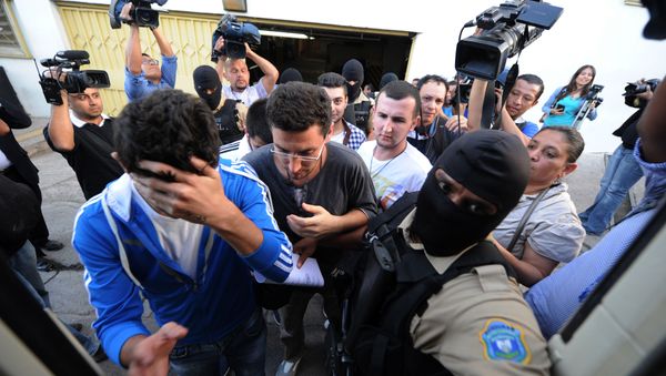 The five Syrian nationals arrested with forged passports leave the court in Tegucigalpa on December 1, 2015 upon being released after paying a USD 500 bail - Sputnik International