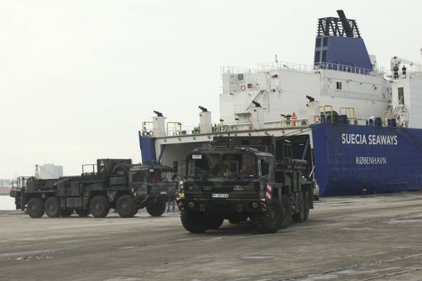 German military trucks carrying NATO's Patriot Missile Defense System to protect Turkey in case neighboring Syria launches an attack leave the port after the parts of system were unloaded in the Mediterranean city of Iskenderun, Turkey, Monday, Jan. 21, 2013 - Sputnik International