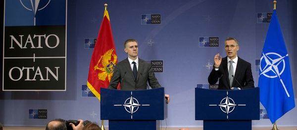 NATO Secretary General Jens Stoltenberg, right, and Montenegro's Foreign Minister Igor Luksic address a media conference at NATO headquarters in Brussels on Wednesday, Dec. 2, 2015 NATO Secretary General Jens Stoltenberg, right, and Montenegro's Foreign Minister Igor Luksic address a media conference at NATO headquarters in Brussels on Wednesday, Dec. 2, 2015 - Sputnik International