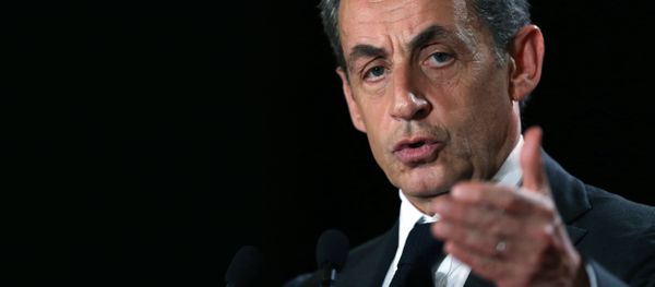 French right-wing opposition Les Republicains (LR) party President Nicolas Sarkozy gestures as he delivers a speech during a campaign rally in support of candidate for the upcoming regional elections in the Normandy region, Herve Morin, on November 30, 2015 in Rouen, northwestern France - Sputnik International