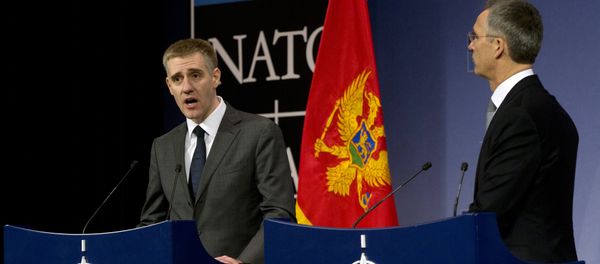 NATO Secretary General Jens Stoltenberg, right, and Montenegro's Foreign Minister Igor Luksic address a media conference at NATO headquarters in Brussels on Wednesday, Dec. 2, 2015 - Sputnik International