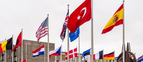 NATO country flags wave outside NATO headquarters in Brussels on Tuesday July 28, 2015 NATO country flags wave outside NATO headquarters in Brussels on Tuesday July 28, 2015 - Sputnik International