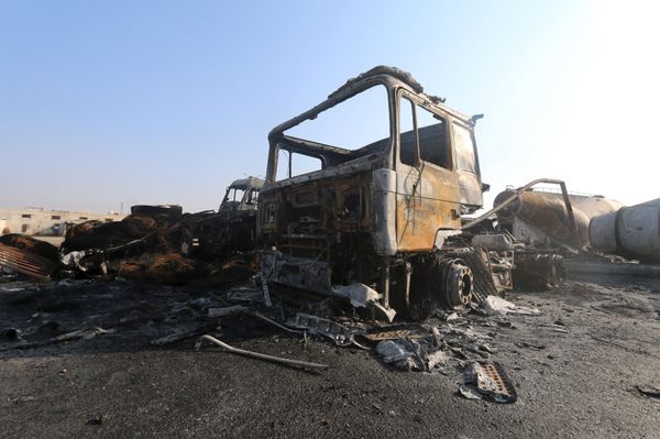 Damaged trucks are pictured after what activists said were air strikes carried out by the Russian air force, on a parking garage for cargo trucks in al-Dana town, near the Syrian-Turkish border in Idlib Governorate November 28, 2015 Damaged trucks are pictured after what activists said were air strikes carried out by the Russian air force, on a parking garage for cargo trucks in al-Dana town, near the Syrian-Turkish border in Idlib Governorate November 28, 2015 - Sputnik International