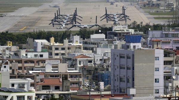 MV-22 Ospreys are seen at the U.S. Marine Corps Futenma Air Station and the surrounding area from an observation deck at a park in Ginowan, Okinawa Prefecture on southern Japan - Sputnik International