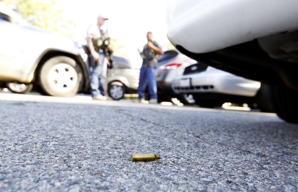 A spent cartrdige lies on the ground as police officers secure the area after at least one person opened fire at a social services agency in San Bernardino. A spent cartrdige lies on the ground as police officers secure the area after at least one person opened fire at a social services agency in San Bernardino. - Sputnik International