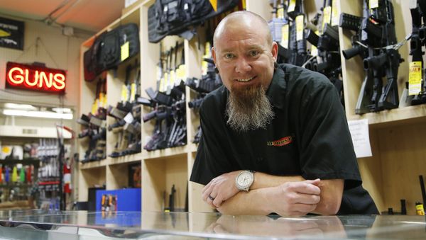 Eric Baker, co-owner of the Mo Money Pawn Shop, poses for a photo at the shop Wednesday, Sept. 23, 2015, in Phoenix. Eric Baker, co-owner of the Mo Money Pawn Shop, poses for a photo at the shop Wednesday, Sept. 23, 2015, in Phoenix. - Sputnik International