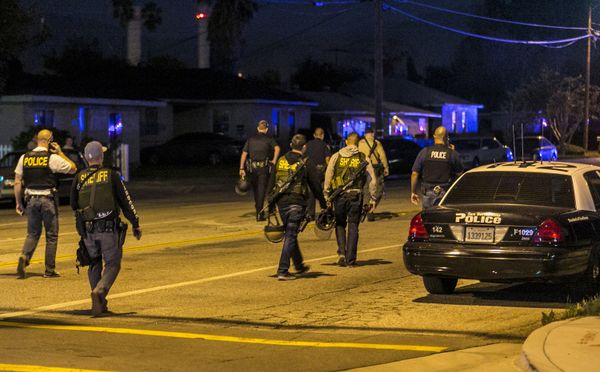Authorities guard the perimeter near the location of an officer-involved shooting Wednesday, Dec. 2, 2015, in San Bernardino, Calif., following a shooting that killed multiple people at a social services center for the disabled Authorities guard the perimeter near the location of an officer-involved shooting Wednesday, Dec. 2, 2015, in San Bernardino, Calif., following a shooting that killed multiple people at a social services center for the disabled - Sputnik International