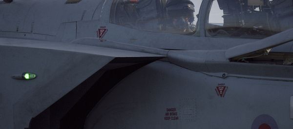 A second pilot looks out from a British Tornado warplane at the RAF Akrotiri, a British air base near costal city of Limassol, Cyprus, Thursday, Dec. 3, 2015, after arrival from an airstrike against Islamic State group targets in Syria. A second pilot looks out from a British Tornado warplane at the RAF Akrotiri, a British air base near costal city of Limassol, Cyprus, Thursday, Dec. 3, 2015, after arrival from an airstrike against Islamic State group targets in Syria. - Sputnik International
