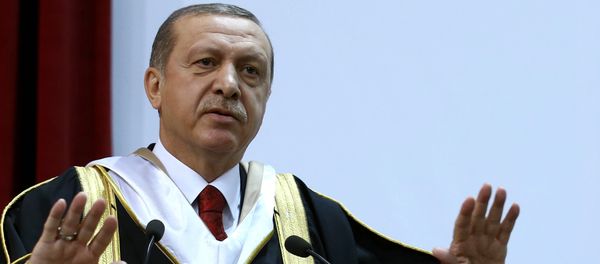 Turkey's President Recep Tayyip Erdogan addresses after he received an honorary doctorate from Qatar University in Doha, Qatar, Wednesday, Dec. 2, 2015 Turkey's President Recep Tayyip Erdogan addresses after he received an honorary doctorate from Qatar University in Doha, Qatar, Wednesday, Dec. 2, 2015 - Sputnik International