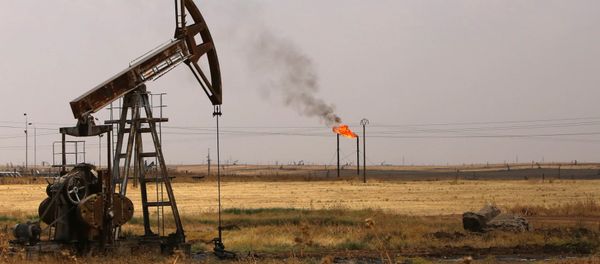 Oil well pumps are seen in the Rmeilane oil field in Syria's northerneastern Hasakeh province on July 15, 2015 - Sputnik International