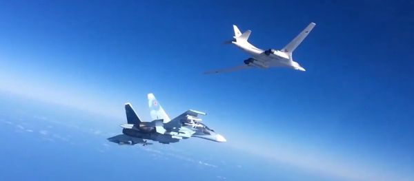 Russian Aerospace Defense Forces' Su-30SM fighter escorts a Tu-160 bomber which fired cruise missiles at Daesh targets in Syria Russian Aerospace Defense Forces' Su-30SM fighter escorts a Tu-160 bomber which fired cruise missiles at Daesh targets in Syria - Sputnik International