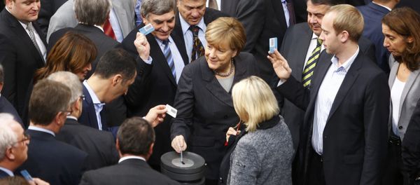 German Chancellor Angela Merkel votes during a session of the Bundestag, the German lower house of parliament, in Berlin, Germany - Sputnik International