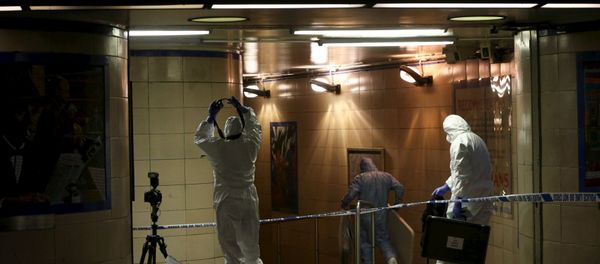 Police officers investigate a crime scene at Leytonstone underground station in east London Police officers investigate a crime scene at Leytonstone underground station in east London - Sputnik International