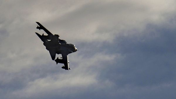 A British Tornado warplane flies over the RAF Akrotiri, a British air base near costal city of Limassol, Cyprus, Thursday, Dec. 3, 2015, after arriving from an airstrike against Islamic State group targets in Syria - Sputnik International
