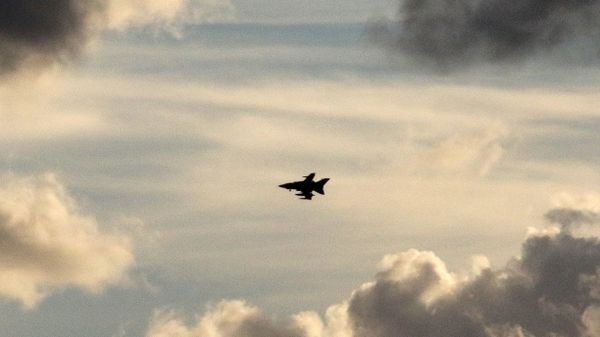A British Tornado jet flies above RAF Akrotiri, a peninsula on the southern coast of Cyprus where Britain retains a military air base, Cyprus December 2, 2015 - Sputnik International