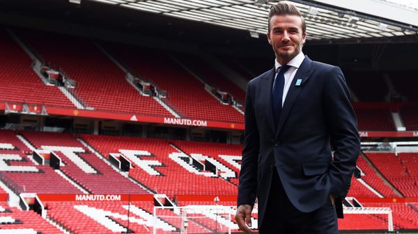 Former Manchester United and England footballer David Beckham poses on the pitch at Old Trafford in Manchester, north west England on October 6, 2015 ahead of a charity football match in aid of UNICEF - Sputnik International