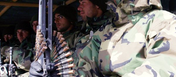 Turkish army troops sit in the back of a military truck as they return from northern Iraq, in Cukurca in Hakkari province at the Turkey-Iraq border, Friday, Feb. 29, 2008. - Sputnik International