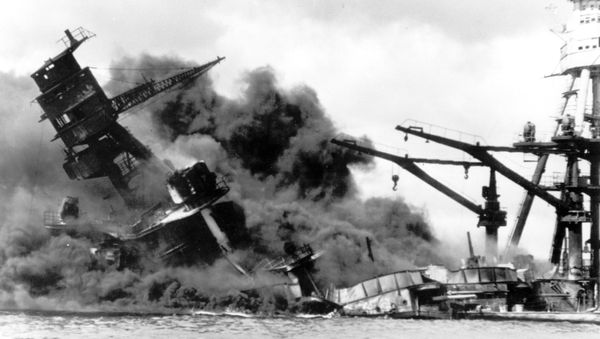 In this photo, the battleship USS Arizona belches smoke as it topples over into the sea during a Japanese surprise attack on Pearl Harbor, Hawaii, December 7, 1941. - Sputnik International