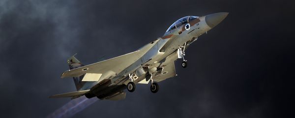An Israeli F-15 E fighter jet takes off during an air show. An Israeli F-15 E fighter jet takes off during an air show. - Sputnik International