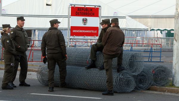 Austrian soldiers stand next to rolls of fence at the border between Slovenian and Austria in Spielfeld, Austria Austrian soldiers stand next to rolls of fence at the border between Slovenian and Austria in Spielfeld, Austria - Sputnik International