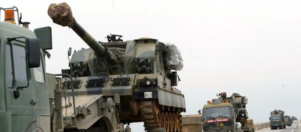 A large convoy of Turkish military including tanks and ambulances rolls from the southeastern part of Turkey toward the Iraqi border (File) A large convoy of Turkish military including tanks and ambulances rolls from the southeastern part of Turkey toward the Iraqi border (File) - Sputnik International