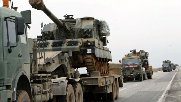 A large convoy of Turkish military including tanks and ambulances rolls  from the southeastern part of Turkey toward the Iraqi border (File) - Sputnik International