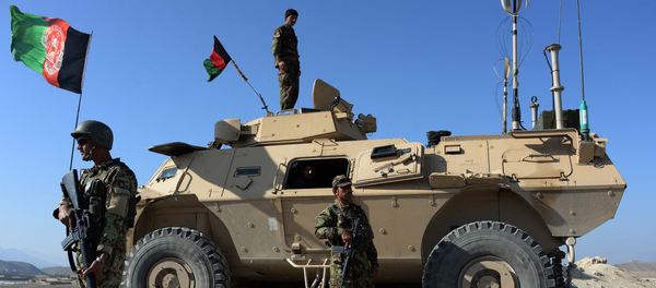 In this photograph taken on December 1, 2015, members of the Afghan security force keep watch during an ongoing operation against Islamic state (IS) groups in Achin district of Nangarhar province - Sputnik International
