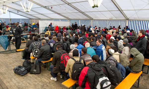 Refugees wait to be registered in a service tent at the train station in the Bavarian city of Passau, southern Germany, Monday, Nov. 2, 2015. Refugees wait to be registered in a service tent at the train station in the Bavarian city of Passau, southern Germany, Monday, Nov. 2, 2015. - Sputnik International