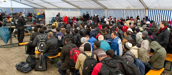 Refugees wait to be registered in a service tent at the train station in the Bavarian city of Passau, southern Germany, Monday, Nov. 2, 2015. Refugees wait to be registered in a service tent at the train station in the Bavarian city of Passau, southern Germany, Monday, Nov. 2, 2015. - Sputnik International