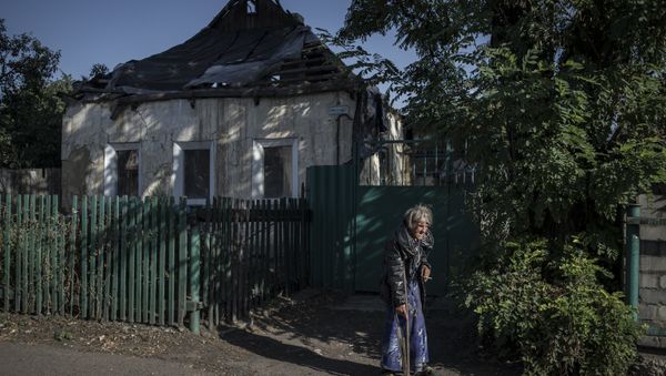 Residents of Staromikhailovka village in Donetsk region Residents of Staromikhailovka village in Donetsk region - Sputnik International
