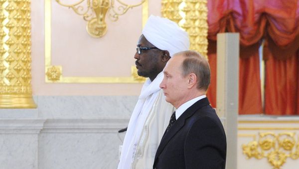 Russian President Vladimir Putin, right, and Ambassador of Sudan to Russia Nadir Yusif Eltayeb Babiker at a ceremony to receive credentials from ambassadors of 15 countries in the Grand Kremlin Palace's Alexander Hall, November 26, 2015 Russian President Vladimir Putin, right, and Ambassador of Sudan to Russia Nadir Yusif Eltayeb Babiker at a ceremony to receive credentials from ambassadors of 15 countries in the Grand Kremlin Palace's Alexander Hall, November 26, 2015 - Sputnik International