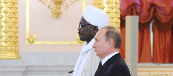 Russian President Vladimir Putin, right, and Ambassador of Sudan to Russia Nadir Yusif Eltayeb Babiker at a ceremony to receive credentials from ambassadors of 15 countries in the Grand Kremlin Palace's Alexander Hall, November 26, 2015 Russian President Vladimir Putin, right, and Ambassador of Sudan to Russia Nadir Yusif Eltayeb Babiker at a ceremony to receive credentials from ambassadors of 15 countries in the Grand Kremlin Palace's Alexander Hall, November 26, 2015 - Sputnik International