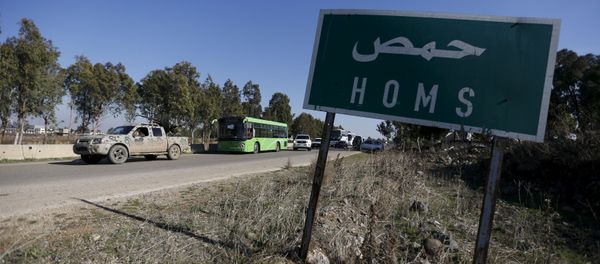 Buses leave district of Waer during a truce between the government and rebels, in Homs, Syria December 9, 2015 Buses leave district of Waer during a truce between the government and rebels, in Homs, Syria December 9, 2015 - Sputnik International