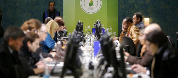 Participants works at computers during the World Climate Change Conference 2015 (COP21) at Le Bourget, near Paris, France, December 9, 2015 - Sputnik International