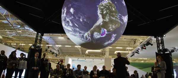 Participants attend a panel entitleScience on a Sphere Presentationat the COP21, United Nations Climate Change Conference, in Le Bourget, north of Paris, Tuesday, Dec. 8, 2015 Participants attend a panel entitleScience on a Sphere Presentationat the COP21, United Nations Climate Change Conference, in Le Bourget, north of Paris, Tuesday, Dec. 8, 2015 - Sputnik International