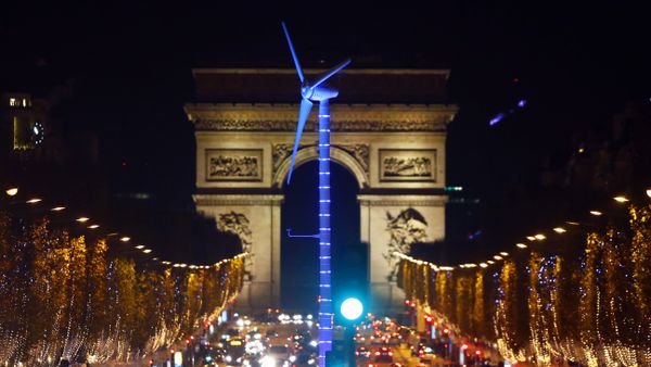 A power-generating windmill turbine is seen on the Champs Elysees avenue with the Arc de Triomphe in background as part of the COP21, United Nations Climate Change Conference, in Paris, Wednesday, Dec. 2, 2015 A power-generating windmill turbine is seen on the Champs Elysees avenue with the Arc de Triomphe in background as part of the COP21, United Nations Climate Change Conference, in Paris, Wednesday, Dec. 2, 2015 - Sputnik International