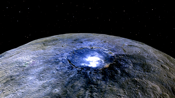 This representation of Ceres' Occator Crater in false colors shows differences in the surface composition. - Sputnik International