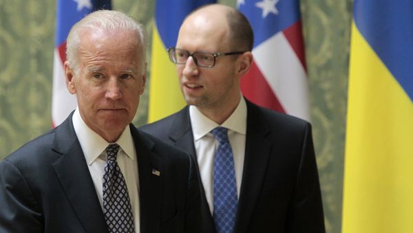 US Vice President Joe Biden, left, and Ukrainian Prime Minister Arseniy Yatsenyuk leave after delivering a joint statement to the press in Kiev, Ukraine, Tuesday, April 22, 2014. US Vice President Joe Biden, left, and Ukrainian Prime Minister Arseniy Yatsenyuk leave after delivering a joint statement to the press in Kiev, Ukraine, Tuesday, April 22, 2014. - Sputnik International