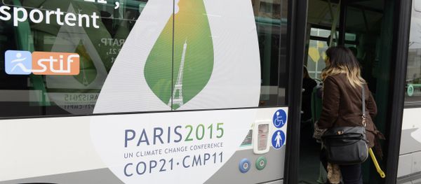 Passengers board a shuttle bus to the COP21 climate summit venue at Le Bourget, northeast of Paris on November 29, 2015 Passengers board a shuttle bus to the COP21 climate summit venue at Le Bourget, northeast of Paris on November 29, 2015 - Sputnik International