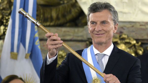 Argentine President Mauricio Macri, already wearing the presidential sash and staff, poses during his inauguration at the Casa Rosada government palace in Buenos Aires on December 10, 2015 Argentine President Mauricio Macri, already wearing the presidential sash and staff, poses during his inauguration at the Casa Rosada government palace in Buenos Aires on December 10, 2015 - Sputnik International