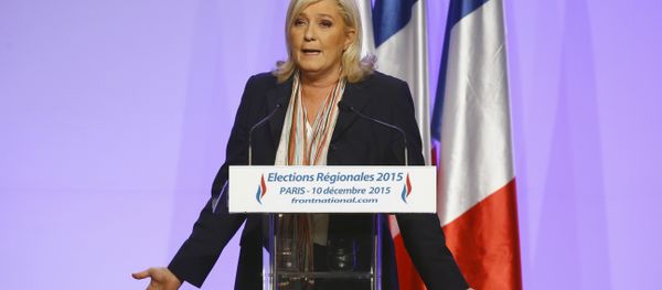 French far-right National Front Party leader, Marine Le Pen delivers a speech during a meeting in Paris, France, Thursday, Dec. 10, 2015. French far-right National Front Party leader, Marine Le Pen delivers a speech during a meeting in Paris, France, Thursday, Dec. 10, 2015. - Sputnik International