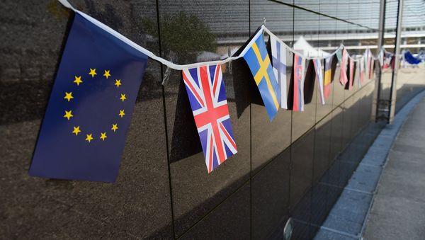An European flag and a British flag stand next to each others outside the European Commission building, in Brussels, on May 8 2015. An European flag and a British flag stand next to each others outside the European Commission building, in Brussels, on May 8 2015. - Sputnik International