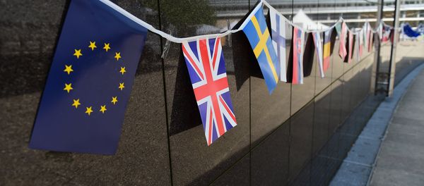 An European flag and a British flag stand next to each others outside the European Commission building, in Brussels, on May 8 2015. An European flag and a British flag stand next to each others outside the European Commission building, in Brussels, on May 8 2015. - Sputnik International