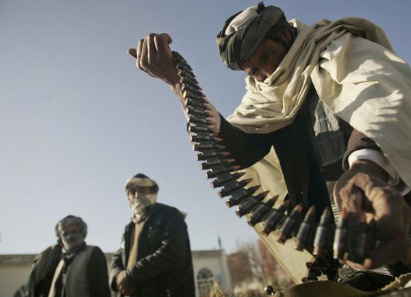 FILE - In this Dec. 28, 2011 file photo, a former Taliban fighter places a range of bullets before surrendering it to Afghan authorities, as part of a peace-reconciliation program in Herat, west of Kabul, Afghanistan - Sputnik International