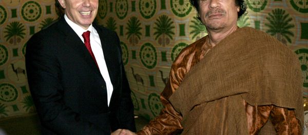 In this Tuesday May 29, 2007 file photo Britain's Prime Minister Tony Blair, left, meets Libyan leader Moammar Gadhafi, at his desert base outside Sirte south of Tripoli. - Sputnik International